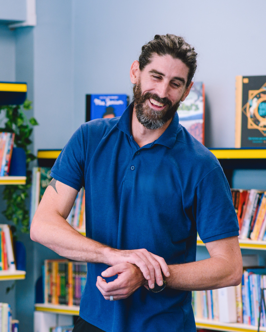 irock coaching smiling and discussing